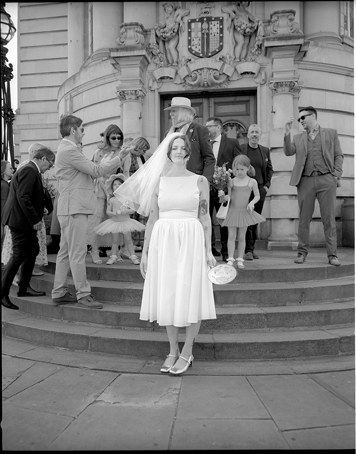Guests celebrating outside Lambeth Town Hall after the ceremony